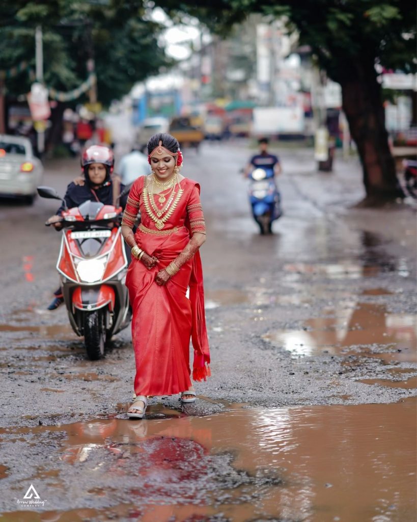 Trending Kerala Bride Poses With Potholes For Her Photoshoot