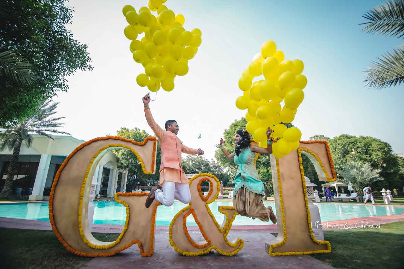 budget wedding decor, budget wedding decor ideas, balloon wedding decor, balloon decor ideas, couple with balloons