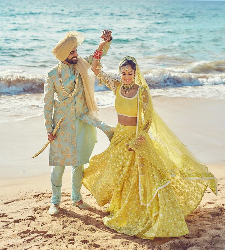 Colour Coordinated Couple Outfit Ideas, bridal outfit ideas, groom outfit ideas, yellow bridal lehenga, sherwani ideas, groom accessories, bridal jewellery, yellow nehru jacket