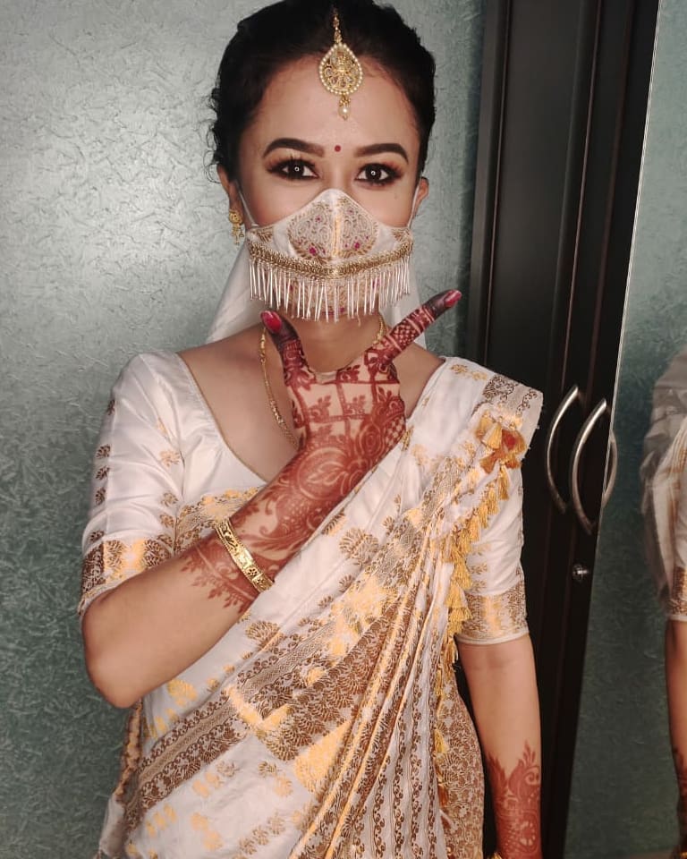 This Assamese Bride Matched A Silk Handloom Mask On Her Wedding