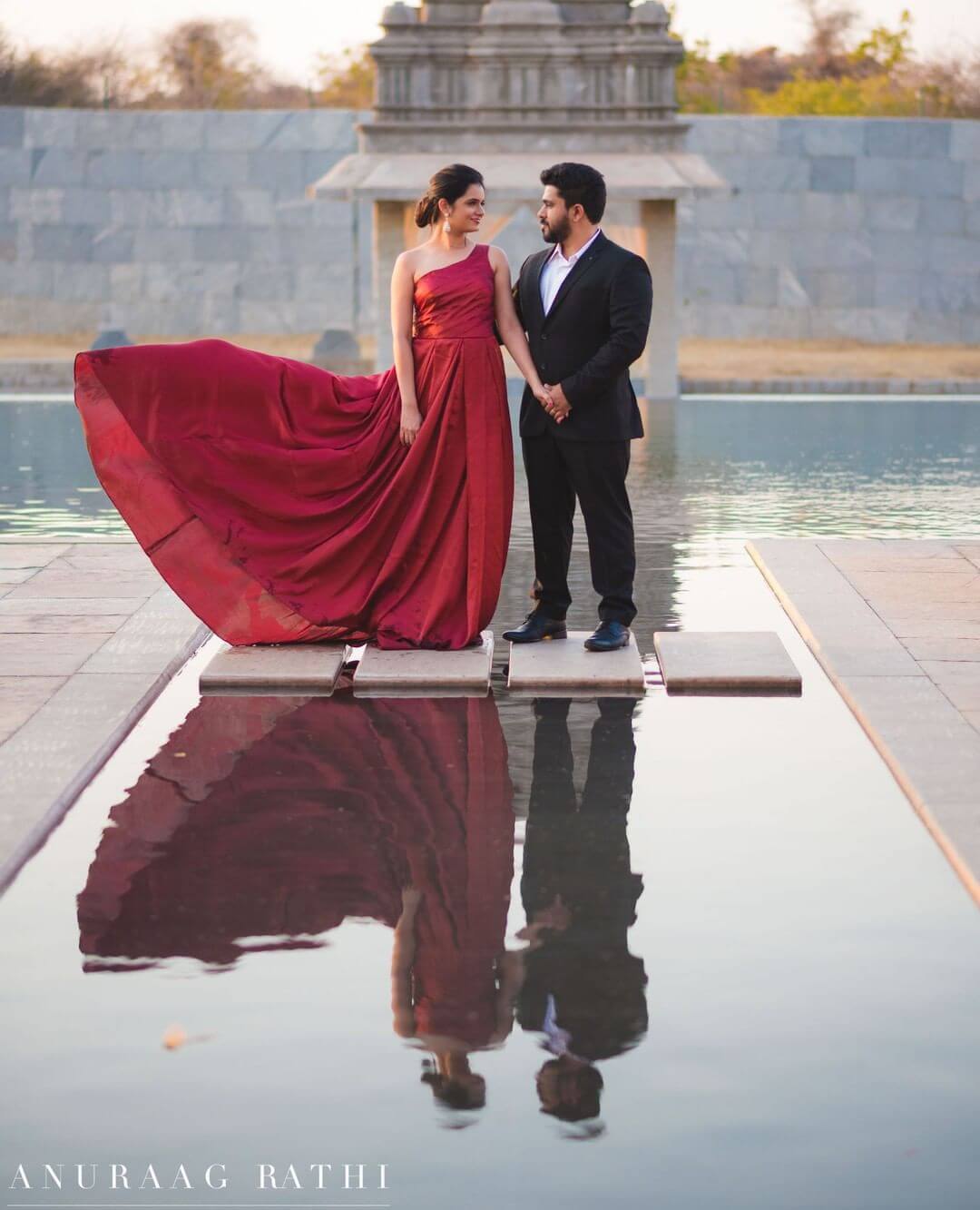 Red pre wedding shoot gown  Kuro Clothing India