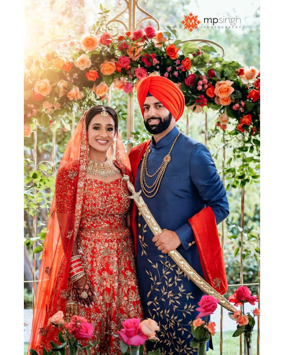 color coordinated sikh couple