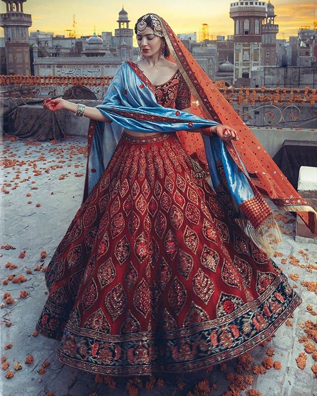 Photo of Red and navy blue bridal velvet lehenga