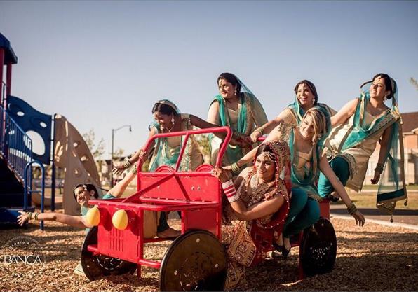 bridal entry with sisters on toy car