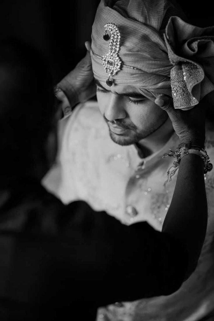 groom wearing safa