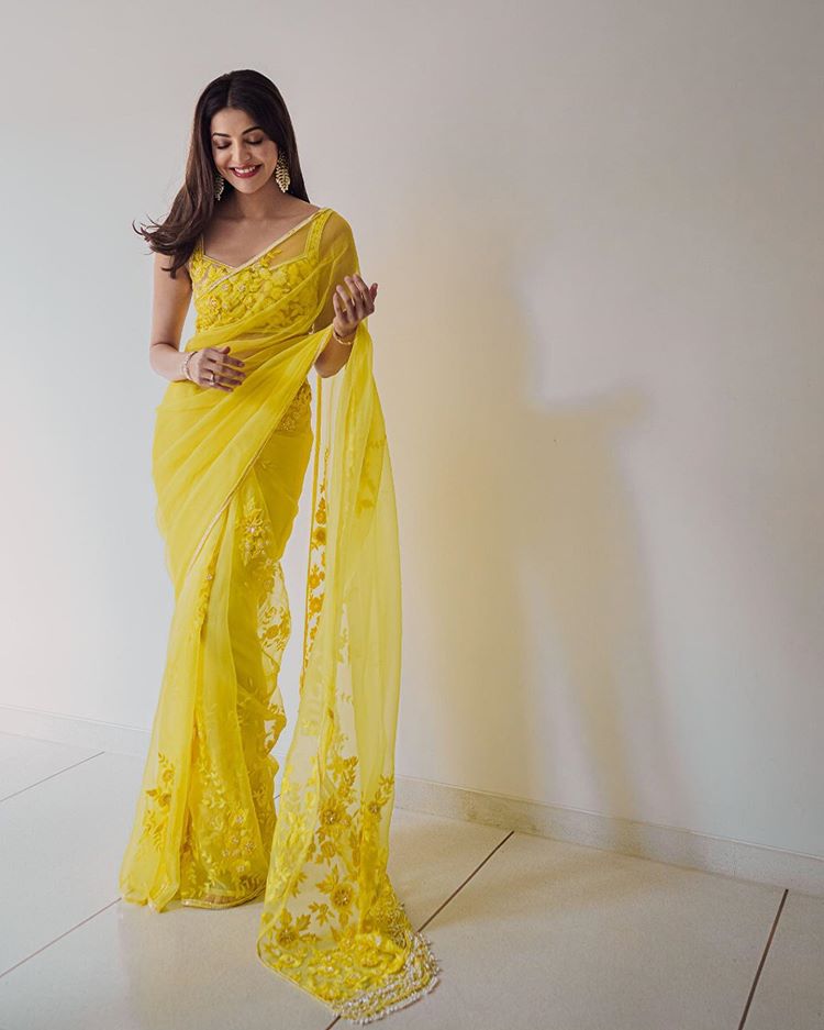 Kajal Aggarwal shines in her heavy embellished gold saree and