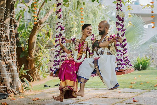 south indian couple's oonjal ceremony