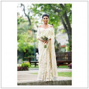 White saree with off-shoulder blouse