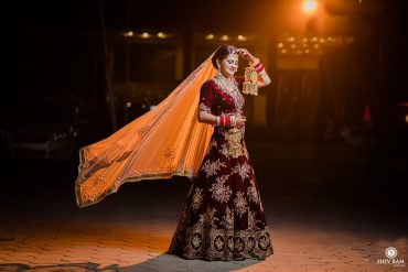 Amritsar Bride In Maroon Velvet Lehenga And Pastel Jewellery