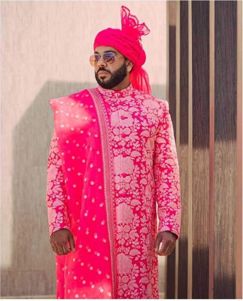 pink groom sherwani