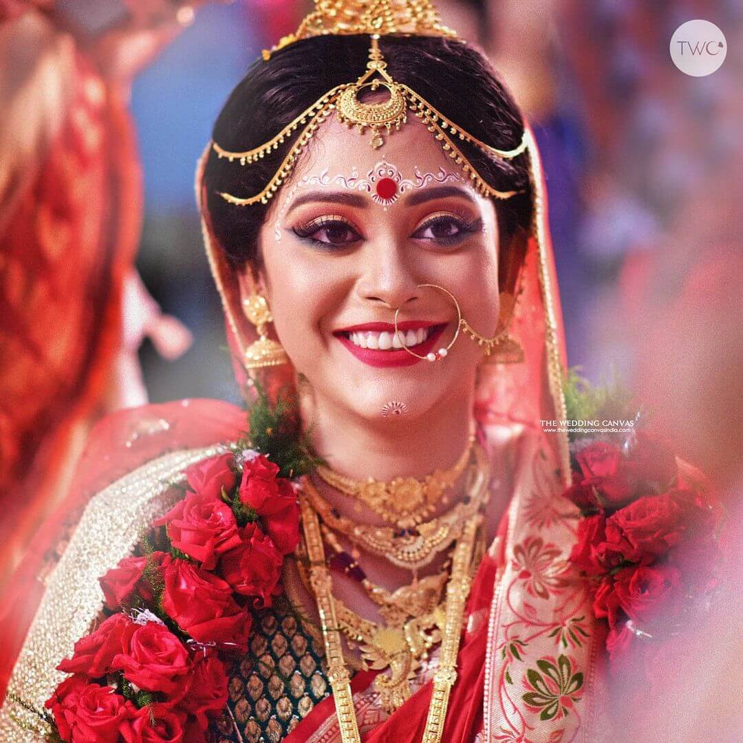 smiling bengali bride