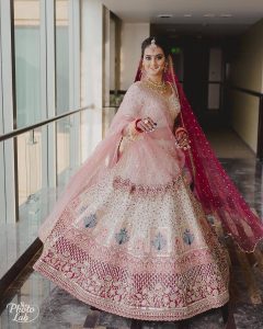 pastel pink lehenga with magenta double dupatta