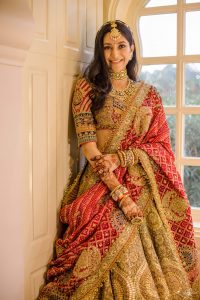 red and olive green lehenga