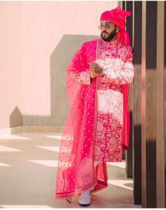 pink sabyasachi groom sherwani