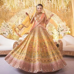 yellow lehenga with orange double dupatta