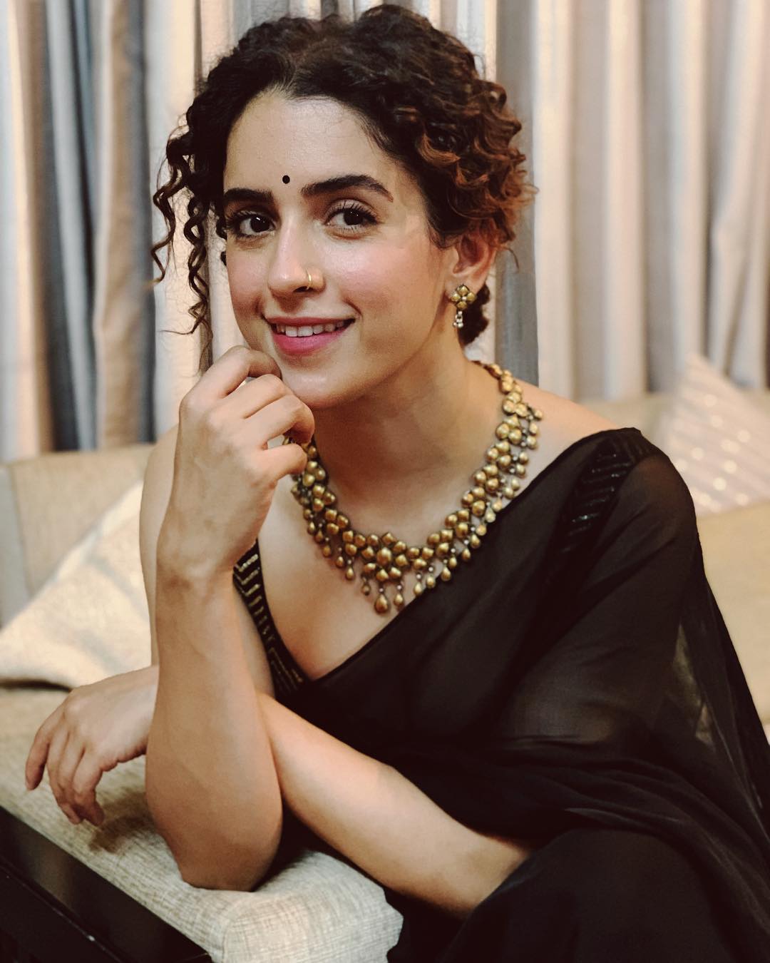 Sanya Malhotra curly hair bun - ShaadiWish
