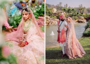 bride in baby pink lehenga