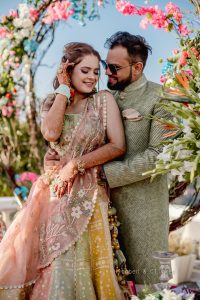 couple poses for wedding pictures