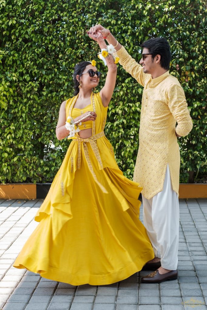 Fun-Filled Wedding In Daman With Bride In Maroon Sabyasachi Lehenga