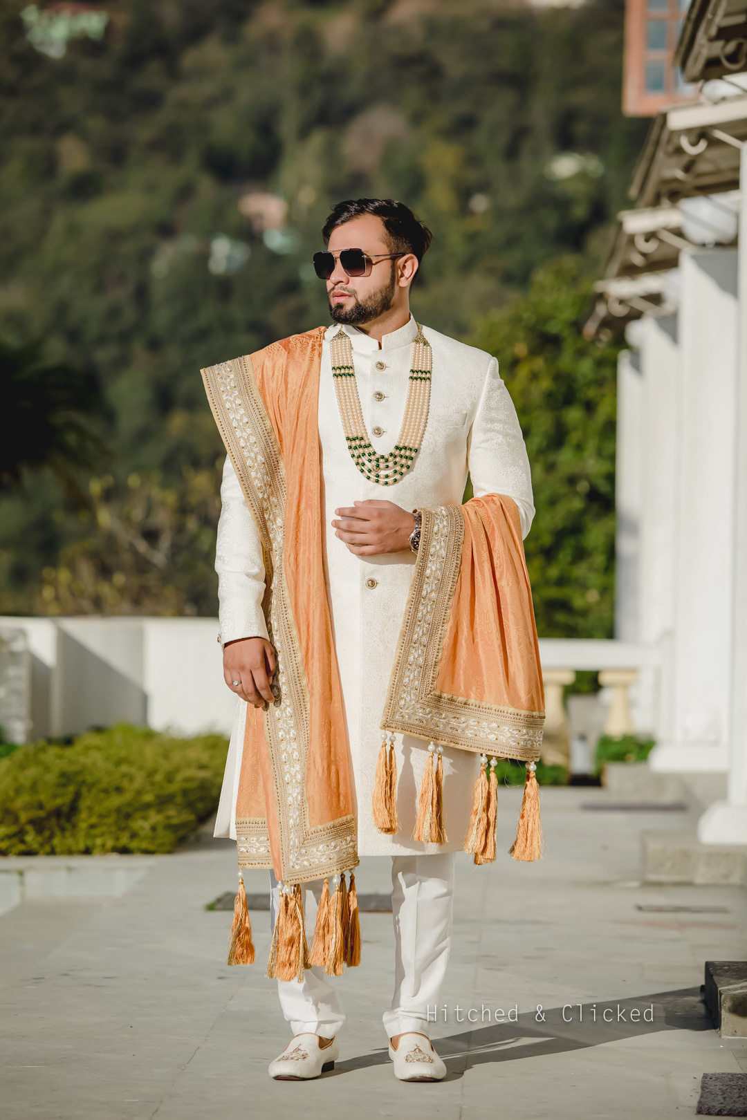 white groom sherwani