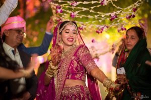 bride dancing at baraat