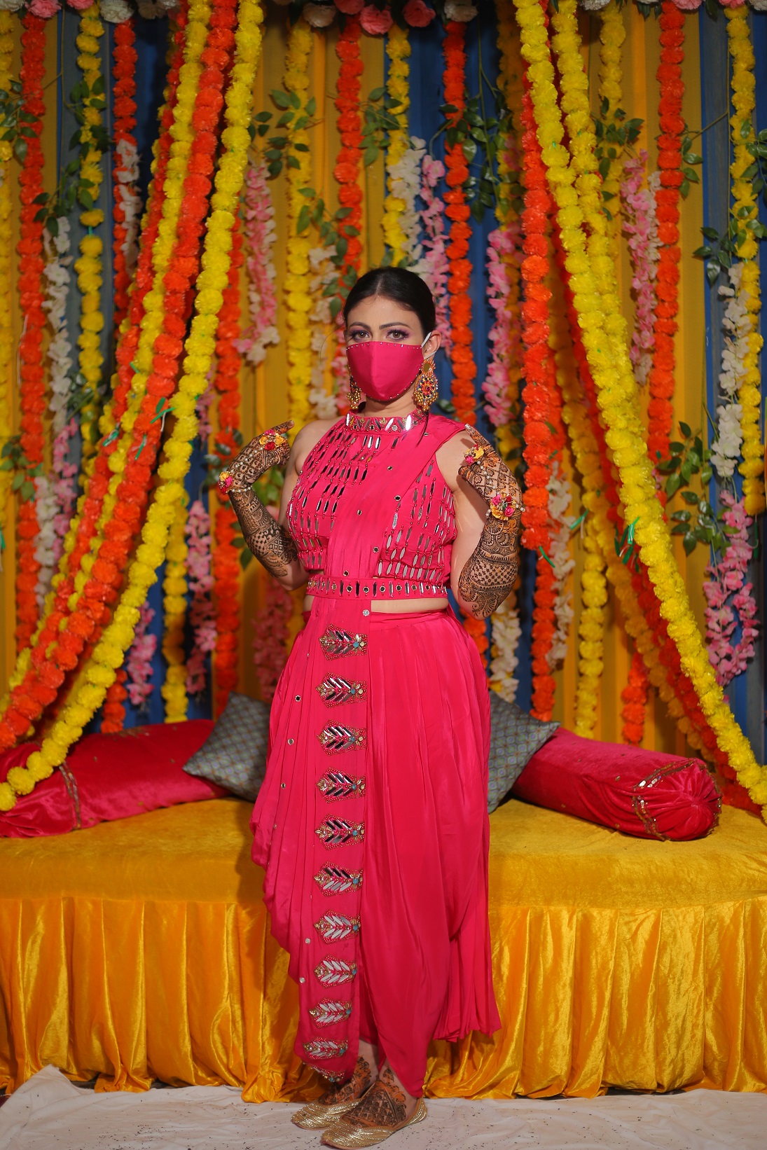 Mehendi outfit with a matching mask