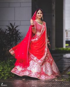 disha parmar red bridal lehenga