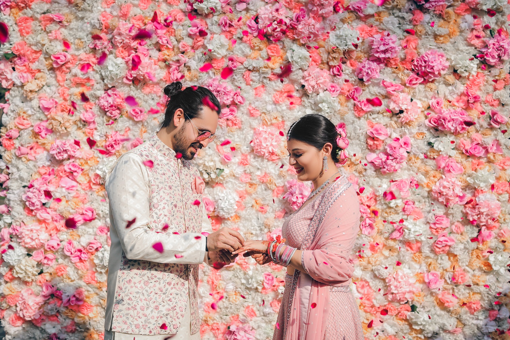 ring ceremony with pink decor