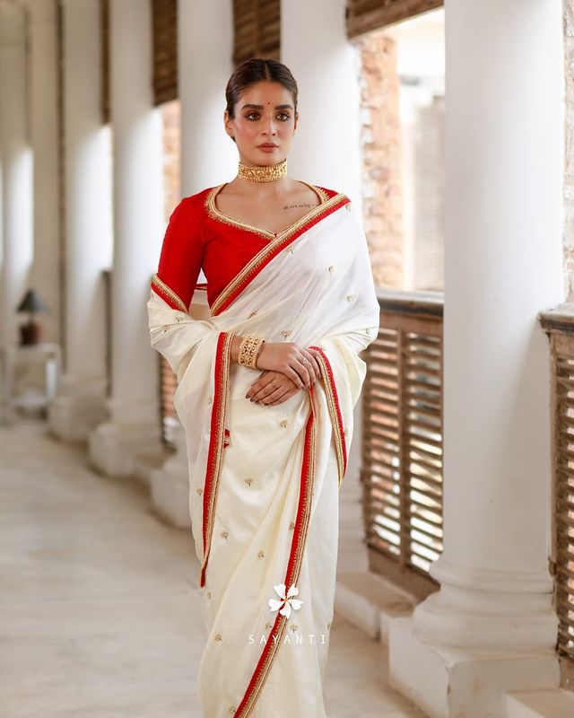 red and white bengali saree
