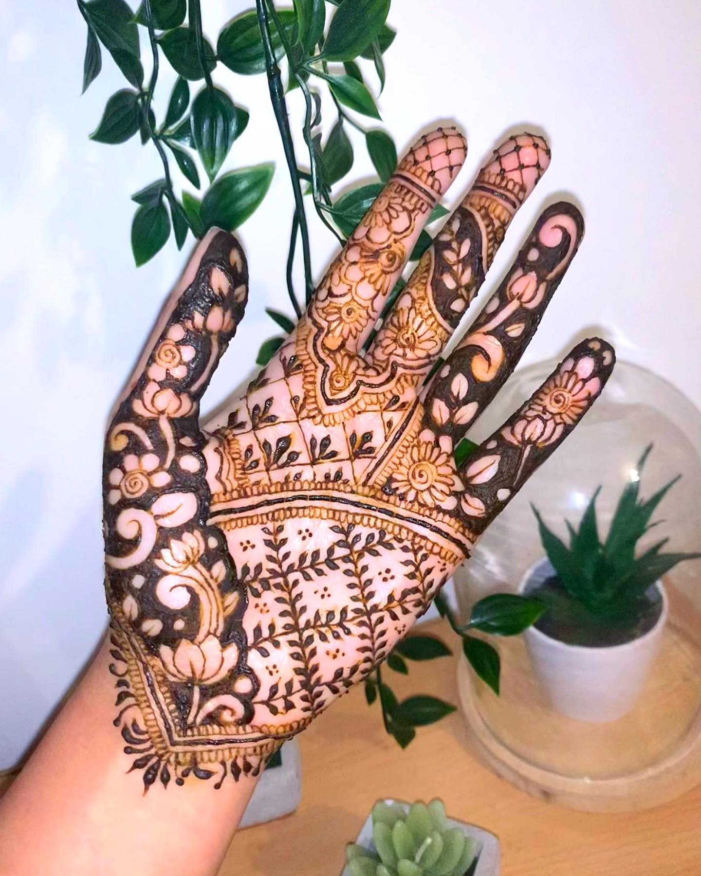 Person showing left hand mendhi tattoo photo – Free Grey Image on Unsplash