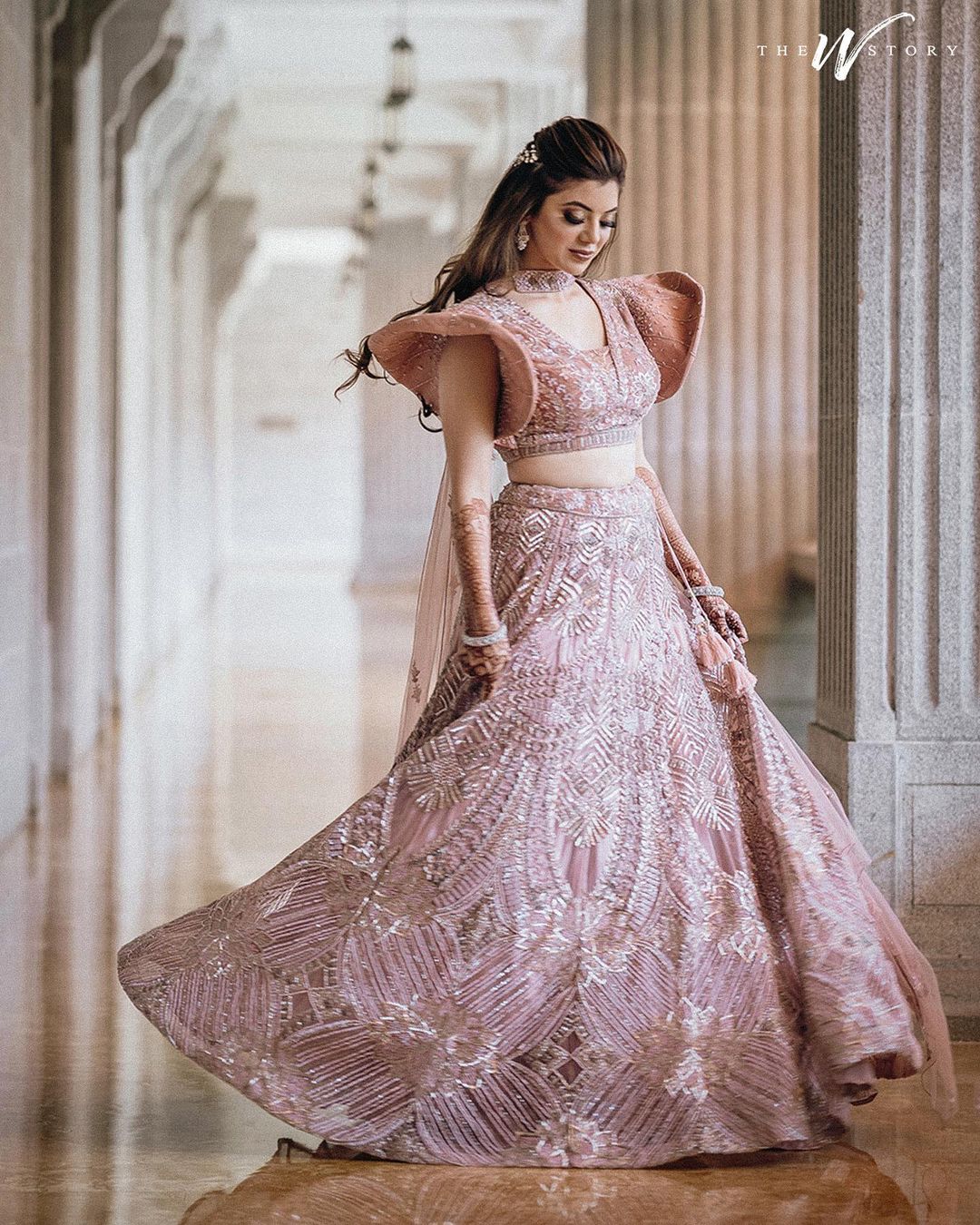 Radhika Merchant embodies cocktail glamour in an Abu Jani Sandeep Khosla  lehenga and gold makeup for her engagement to Anant Ambani | Vogue India