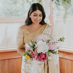 white and gold saree