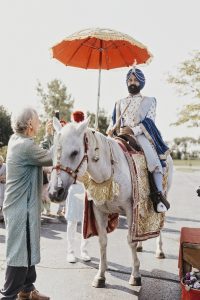 groom on a horse