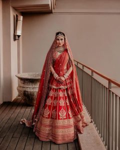 mouni roy red sabyasachi lehenga