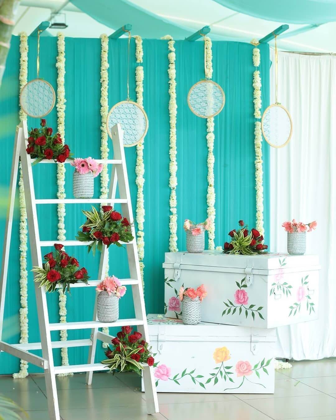 Haldi Function Decor Ideas That Include Colorful Trunks