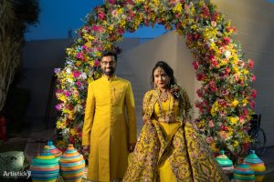 couple in color coordinated outfits